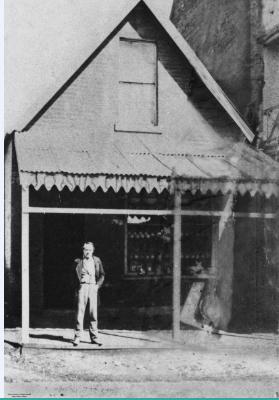 Davis outside his store, c 1874