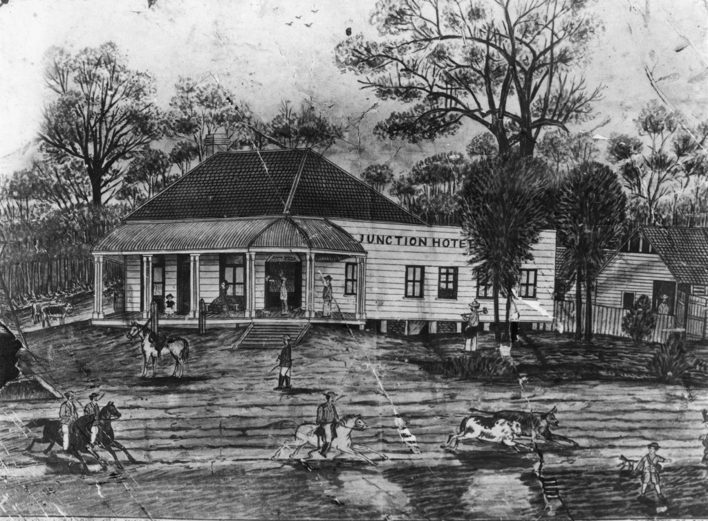 The Junction Hotel was a one-story hotel with a sloping verandah situated on the corner of Ipswich Road and Annerley Road, Annerley. The sketch is in black and white, featuring men on horses in the grounds of the hotel. According to a report in the Brisbane Courier dated the 16 December 1884, the hotel was destroyed by fire on the 14 December 1884.